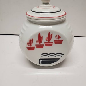 Covered Grease jar 30 oz. Capacity in white with red and black design. image 2