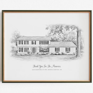 May include: A black and white pencil sketch print of a two-storey house with shutters and a large tree, framed in a dark border. The text reads: Thank You For The Memories, 2230 RADFORD ST NW, NORTH CANTON, OH. The artwork is on a white background.