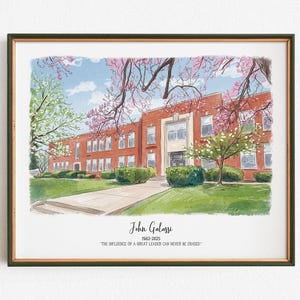 May include: Watercolor print of a brick building with a white entrance, framed in a dark green frame. The building is surrounded by green grass, bushes, and trees with pink and white blossoms. The text "John Galassi 1962-2025" and a quote are below the building.