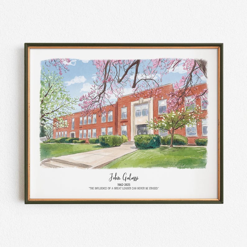 May include: Watercolor print of a brick building with a white entrance, framed in a dark green frame. The building is surrounded by green grass, bushes, and trees with pink and white blossoms. The text "John Galassi 1962-2025" and a quote are below the building.
