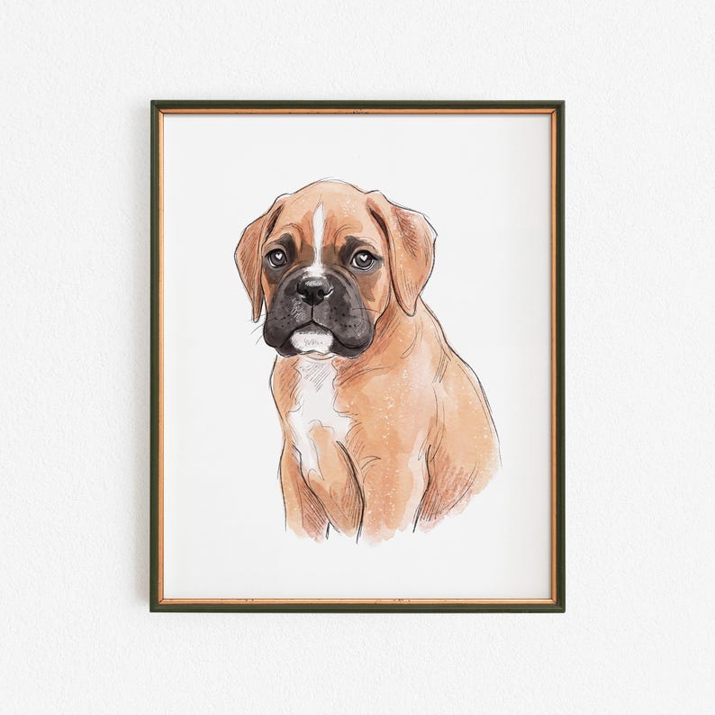 May include: A framed watercolor print of a Boxer puppy. The dog has a tan coat with white markings on its chest and face. The artwork is set against a white background and framed in a dark green frame.