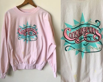 1980年代 イエス・キリスト「キリストを通して勝利する者」ヴィンテージ 80年代 クリスチャン ピンク 長袖 Tシャツ