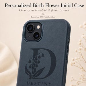 May include: A dark blue PU faux leather phone case featuring an engraved large letter D, a lily of the valley flower illustration, and the name DESTINY. The text Personalized Birth Flower Initial Case and Engraved PU Faux Leather is visible.
