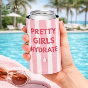 May include: A pink and white striped can cooler with the text "PRETTY GIRLS HYDRATE" in red. The words "POOL SIDE MUST HAVE" are at the top. The cooler is held in front of a pool with sunglasses in the foreground.