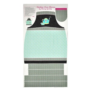 May include: A sewing pattern for a kitchen apron with a teal teapot and cup design. The pattern includes instructions for making the apron and a pocket. The text on the pattern reads "Kitchen Love Apron by Cherry Guidry".