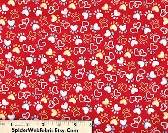 Tissu pattes et coeurs de chien : impression canine fantaisie sur coton rouge