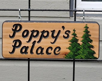 Custom carved Cedar wood Sign with 2  hand painted pine trees. Two lines for your wording