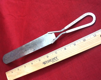 SNOW WHITE GROCERY Advertising Kitchen Utensil (#5): Vintage Tempered Steel - a Cooking Giveaway from Flandreau, S.D.  1920's - 1950's.