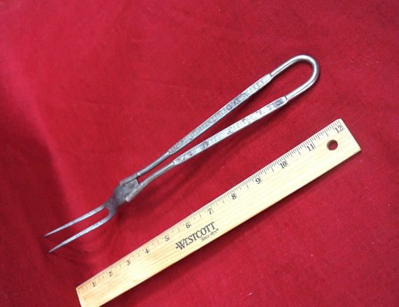 SOUTH DAKOTA ADVERTISING Kitchen Utensil (#6):Vintage Tempered Steel-Cooking Giveaway from Emry's Market in Madison, S.D.- 1920's - 1950's.