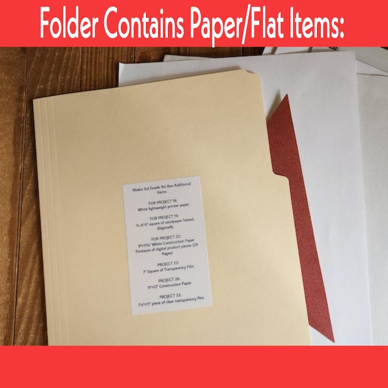 May include: A light beige manila file folder containing white and red paper items. A white label is affixed to the front with the text: Abeka 3rd Grade Art Box Additional Items: FOR PROJECT 18: White lightweight printer paper, FOR PROJECT 19: 1/2 of 6" square of sandpaper halved diagonally, FOR PROJECT 22: 9"x11 3/4" White Construction Paper, Printouts of digital product pieces (20 Pages), PROJECT 23: 7" Square of Transparency Film, PROJECT 26: 9"x12" Construction Paper, PROJECT 33: 7 1/2"x11" piece of clear transparency film.