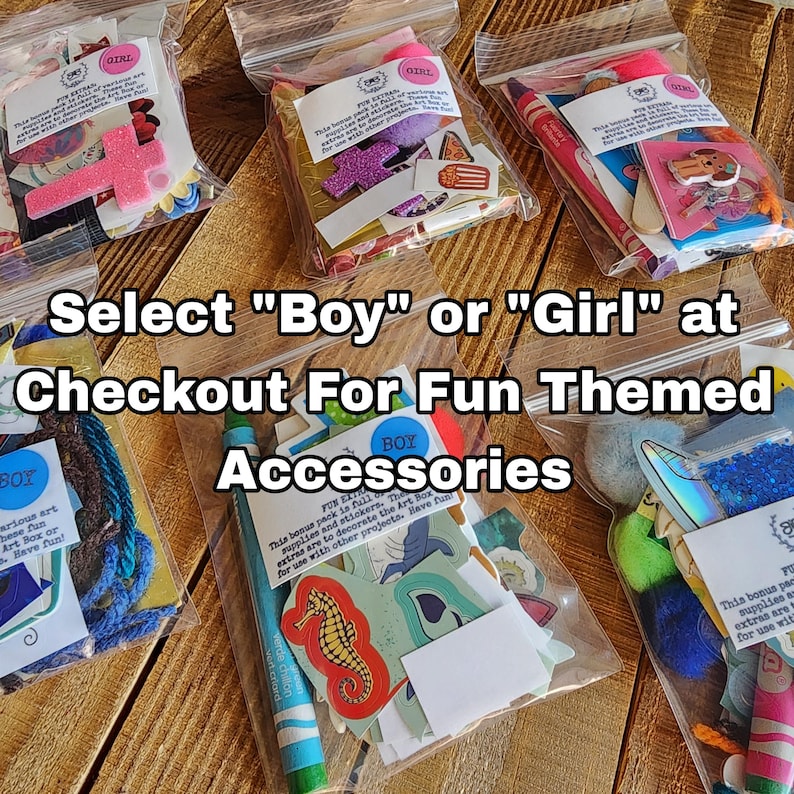 May include: Six clear plastic bags containing assorted craft supplies, including stickers, crayons, and decorative shapes. Each bag features a label marked with either Boy or Girl. The text Select Boy or Girl at Checkout For Fun Themed Accessories is overlaid.