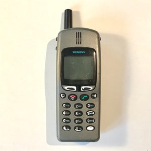TÉLÉPHONE VINTAGE MITSUBISHI Trium MT-050 (non testé) EUR 10,00 TÉLÉPHONE VINTAGE MITSUBISHI Trium MT-050 (non testé) EUR 10,00