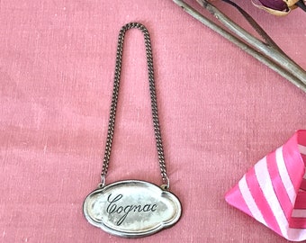 Cognac silver plated bottle decanter label (1980s)