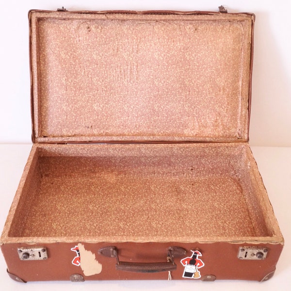 Brown cardboard suitcase for storage (1950s)