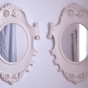 Pair of Oval Mirrors with Scroll-Inspired Frames – Vintage Elegance from the 1980s
