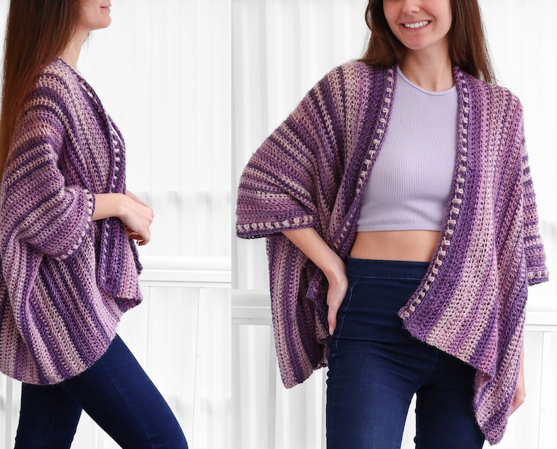 May include: A purple and pink striped crochet cardigan with a loose fit and a slightly asymmetrical hem.