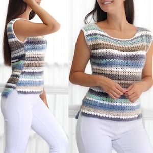 May include: A striped crochet top with a scoop neck and sleeveless design. The top is made with a variety of blue, green, brown, and white yarn.