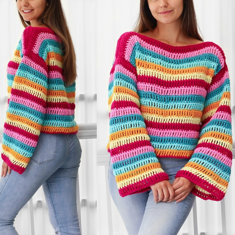 Peut inclure: Un pull en crochet ray&eacute; color&eacute; &agrave; manches longues et col bateau. Le pull est r&eacute;alis&eacute; avec une vari&eacute;t&eacute; de couleurs vives, dont le rose, le jaune, le bleu et l'orange.