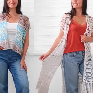 May include: A short-sleeved, open-front crochet cardigan featuring a horizontal striped pattern in shades of brown, white, and light blue, alongside a long, white, open-front crochet duster cardigan with short sleeves and a fringed hemline.