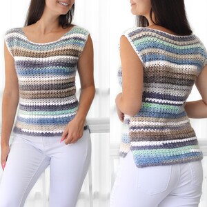 May include: A striped crochet top with a scoop neck and sleeveless design. The top is made with a variety of colors, including white, blue, brown, and green.