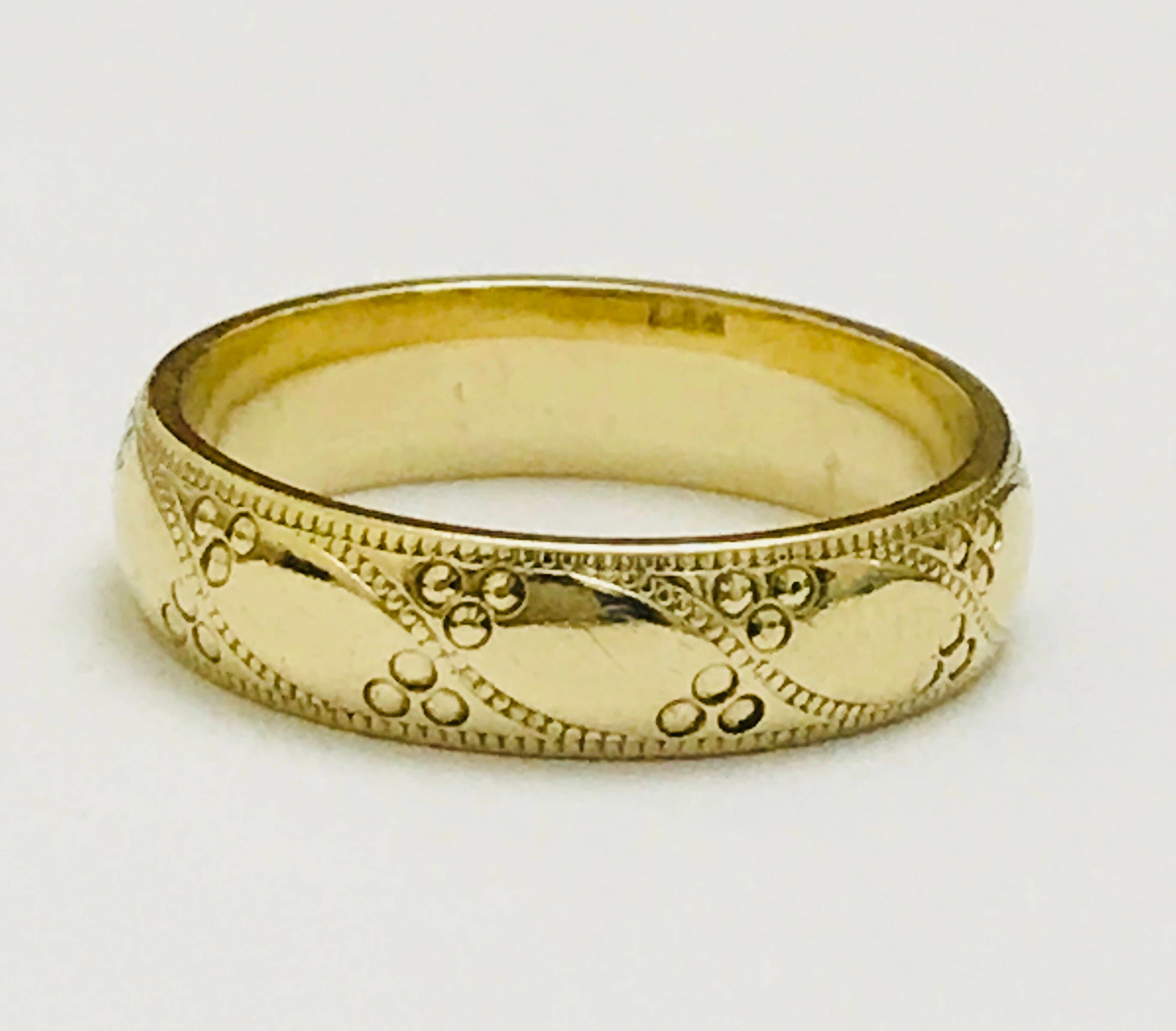 Yellow gold patterned wedding on sale rings