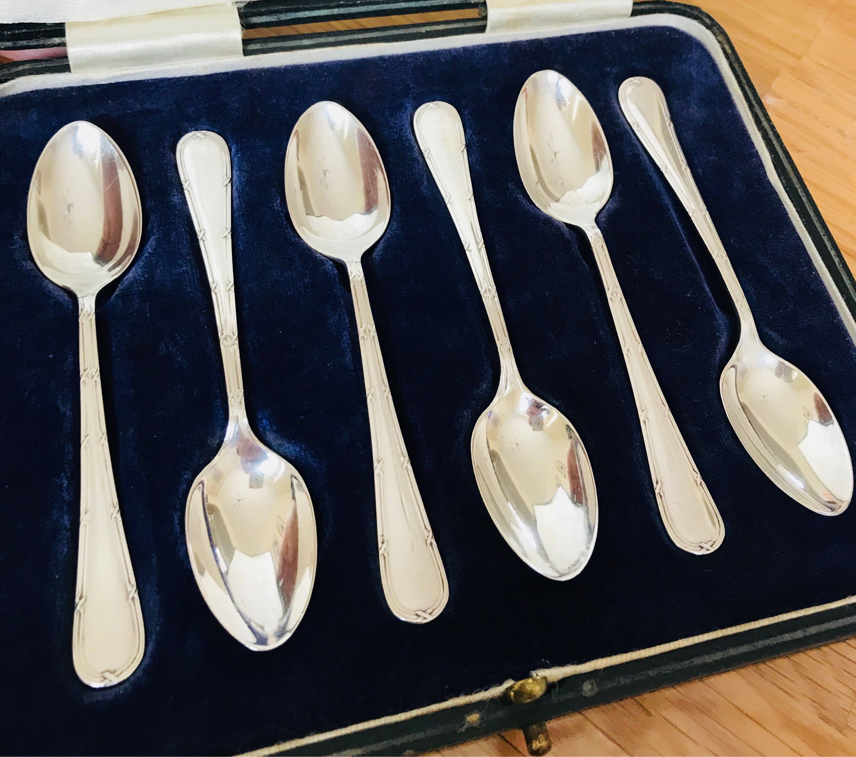 Superb cased set of antique solid sterling silver spoons Made in