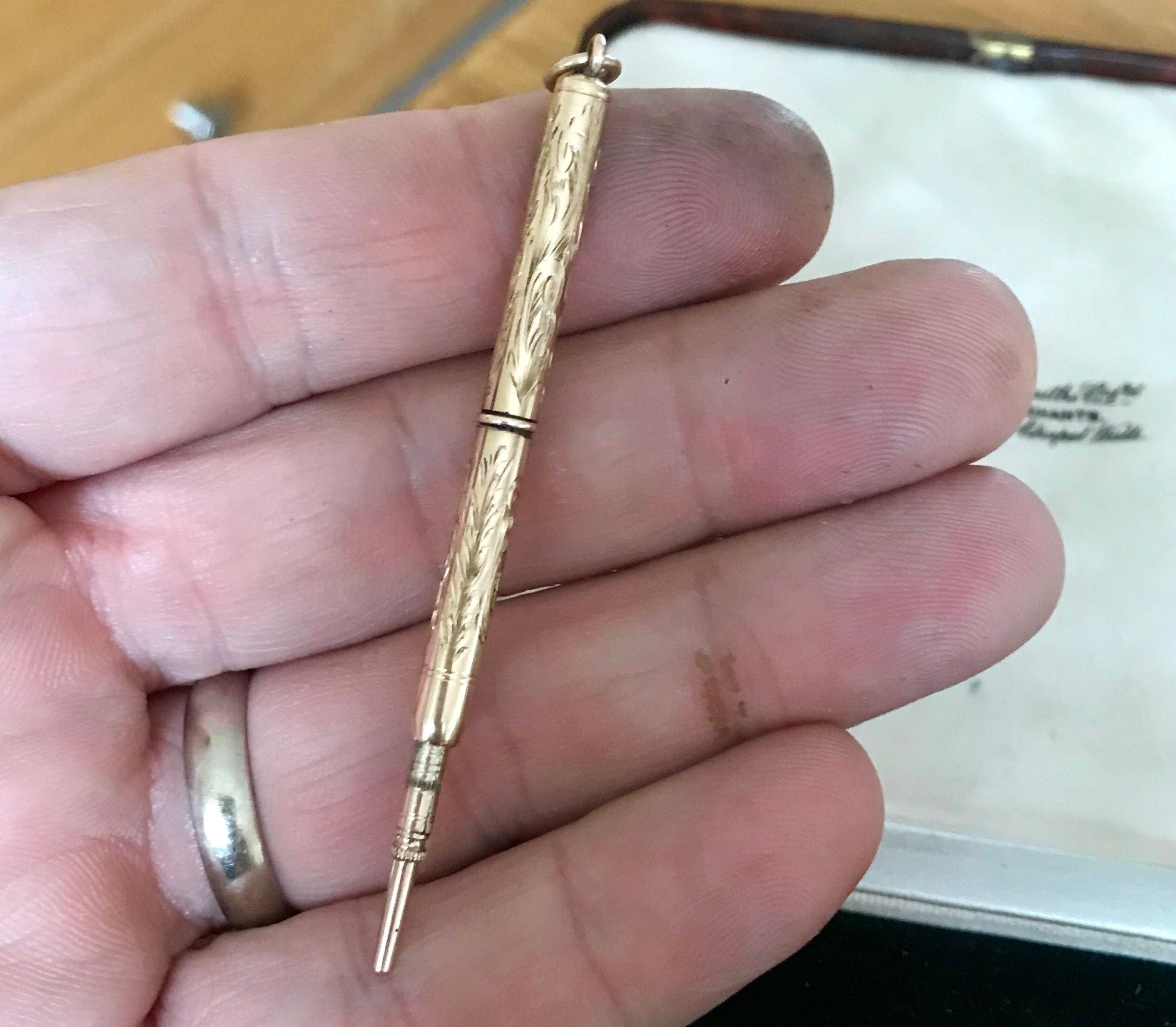 gold propelling pencil
