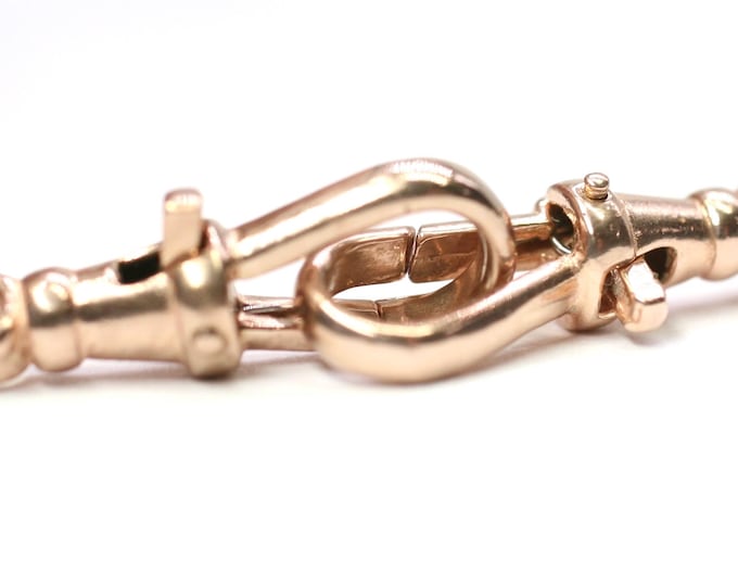 Matching pair of vintage 9ct rose gold lever back dog clips