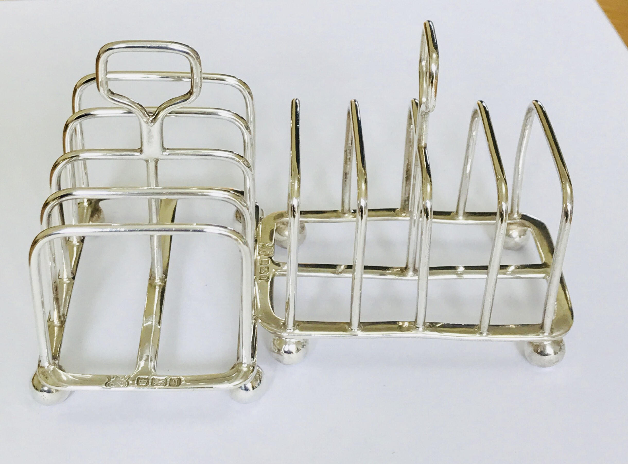 Superb matching pair of antique Edwardian sterling silver toast ...