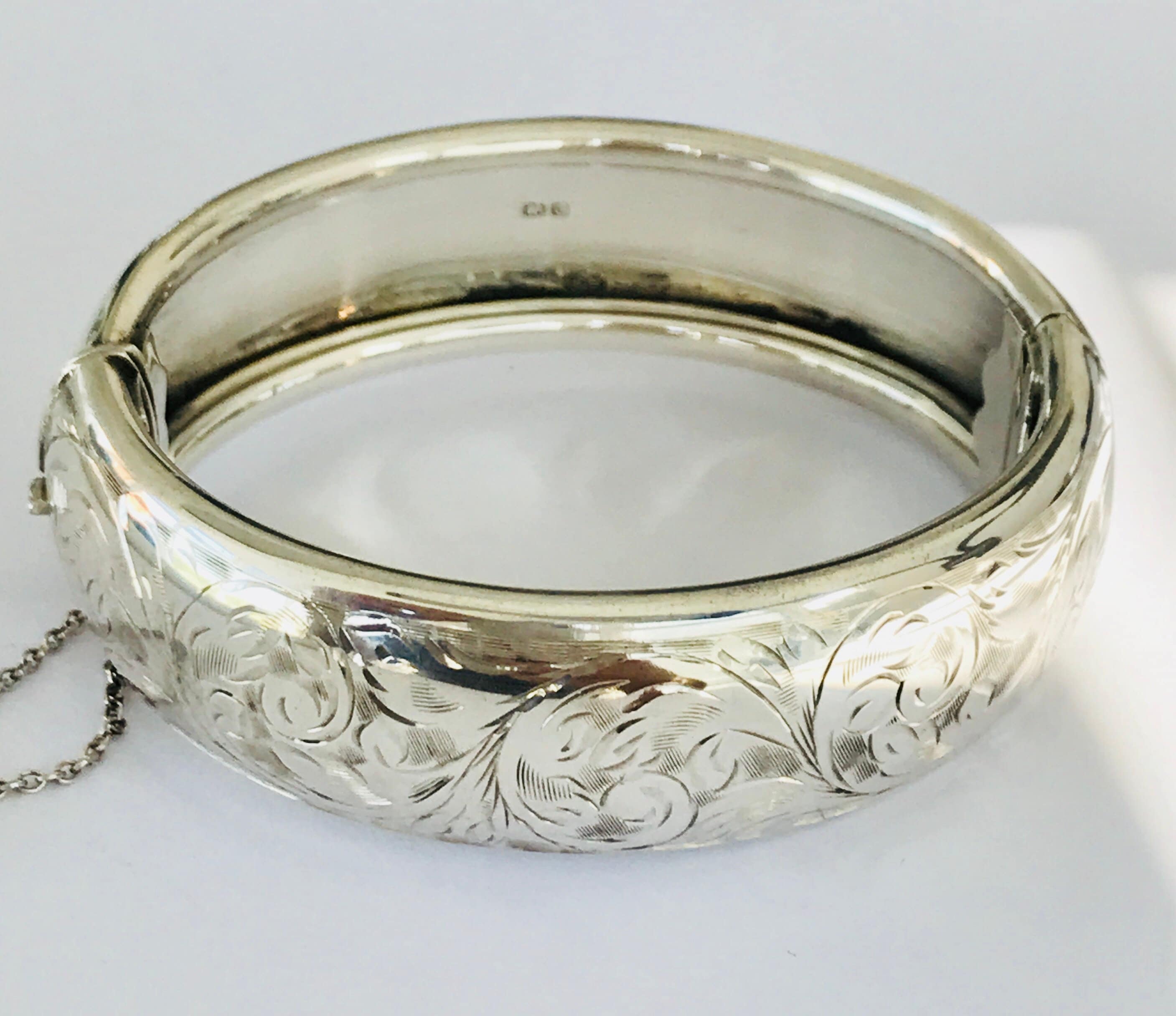 Superb vintage sterling silver embossed bangle hallmarked Chester 1957
