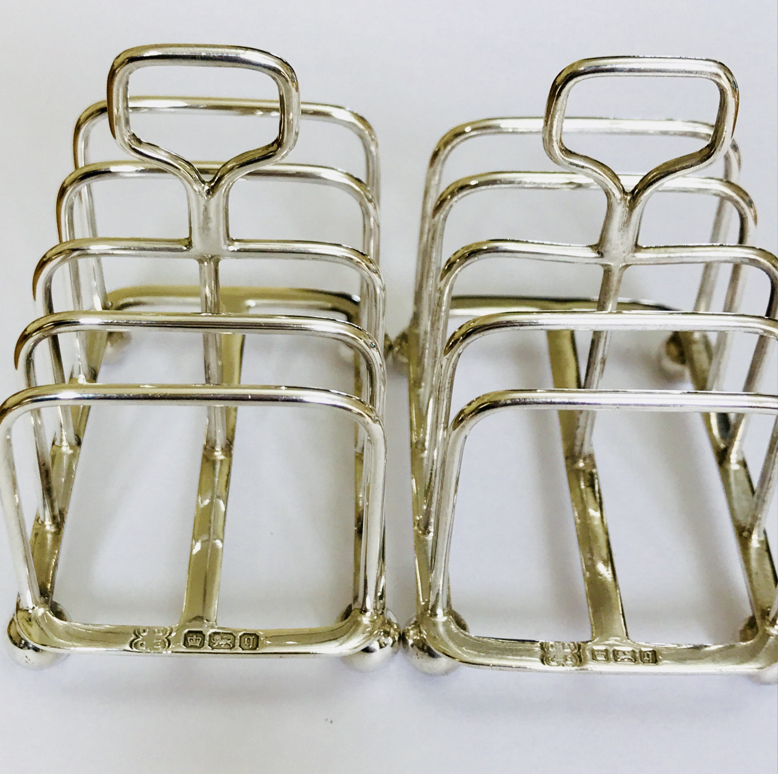 Superb matching pair of antique Edwardian sterling silver toast ...