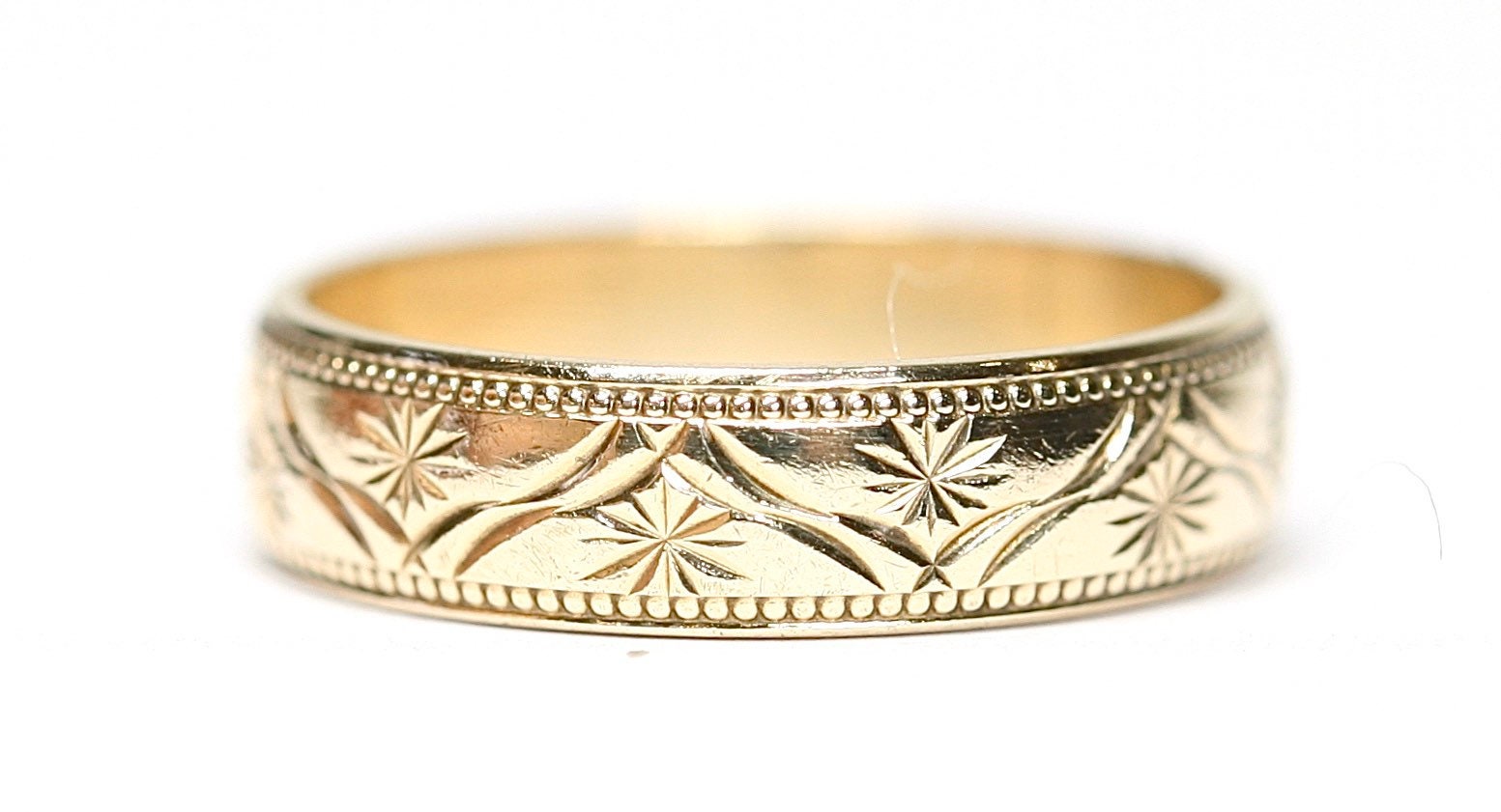 Vintage 9ct gold patterned wedding ring fully hallmarked