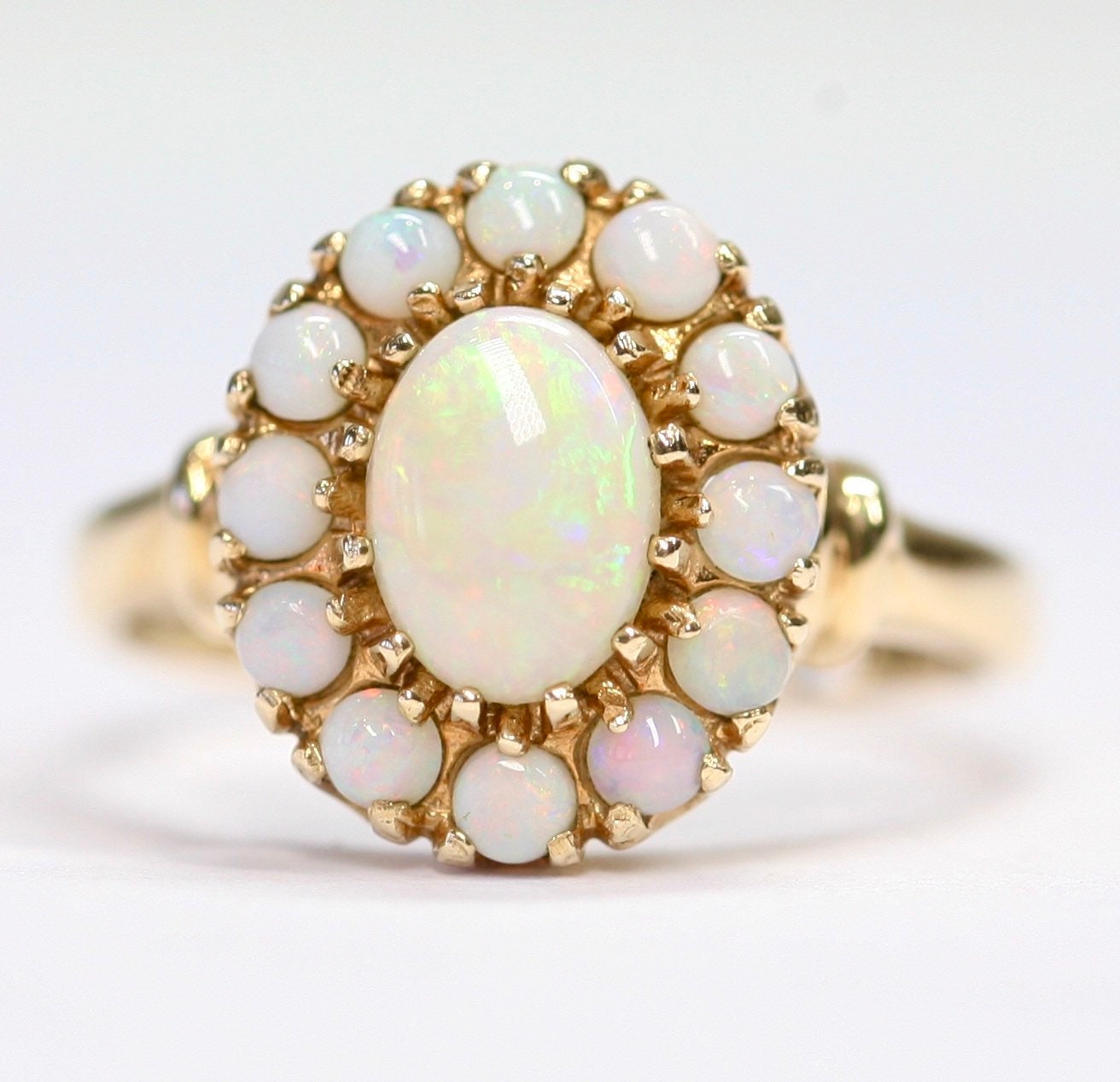 An exceptional and beautifully coloured vintage 10ct gold Opal cluster ...