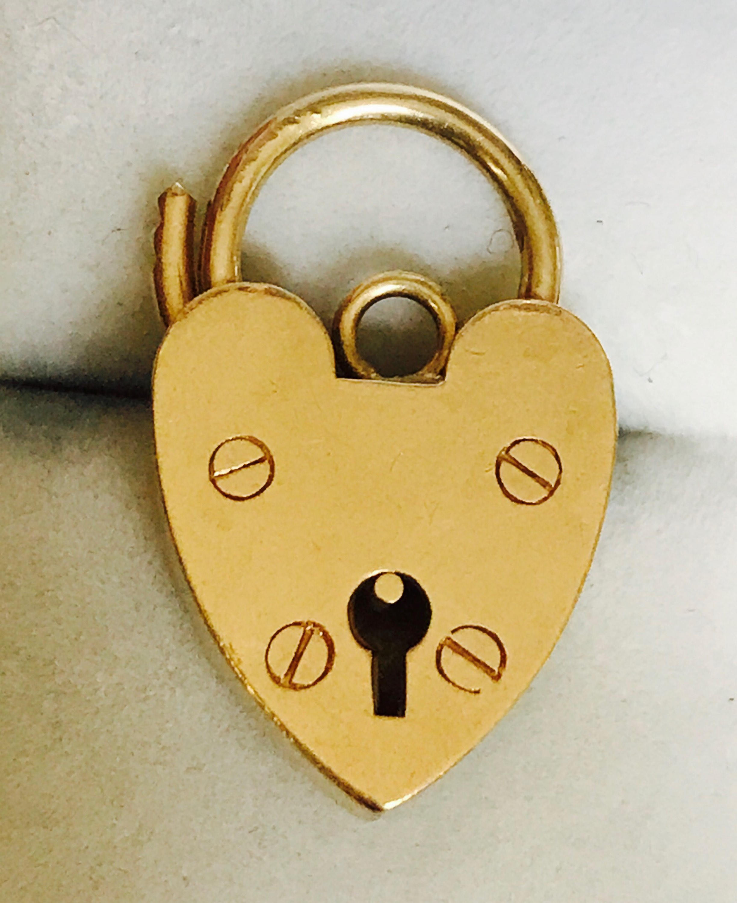 Lovely heavy vintage solid 9ct yellow gold padlock for charm bracelet