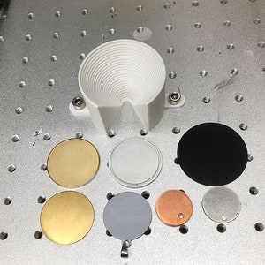 Dispositivo de fixação circular para laser de fibra (não para gravação profunda).