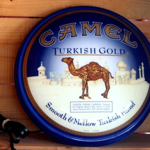 is camel gold a light cigarette New Came "Gold"? I asked for pack of my usual (Yellow pack) and got handed these. They seem to be quite different. this new packaging or a completely Vintage Camel Gold Box Disposable