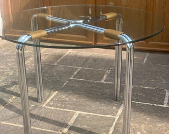 A Vintage Modernist Glass and Chrome Dining Table.