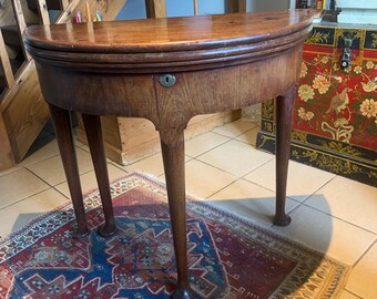 An 18th Century Mahogany Tea/Games/Writing Table.