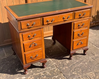 An Edwardian, Georgian Style Walnut Desk.