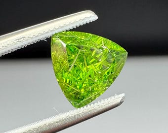One of a Kind Russian Demantoid Garnet. 1.47ct trillion.