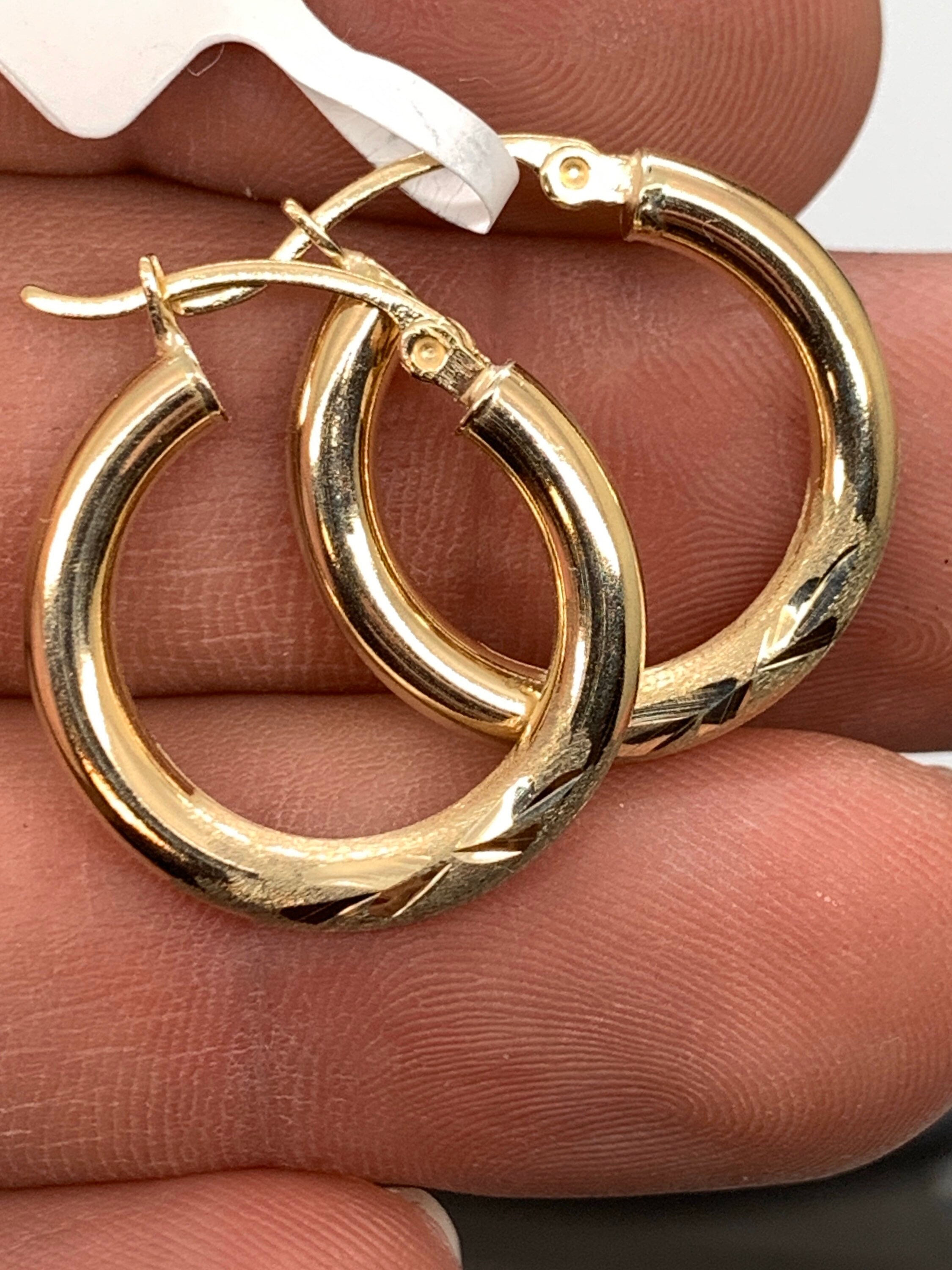 Classy, thick gauge, etched and brushed 14k gold hoop earrings.