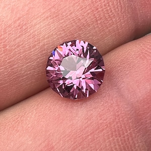 Rare pink, fuchsia color Garnet. Natural, Tanzanian origin gem. Precision cut round. 7.4mm image 1