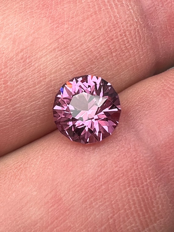 Rare pink, fuchsia color Garnet. Natural, Tanzanian origin gem. Precision cut round. 7.4mm