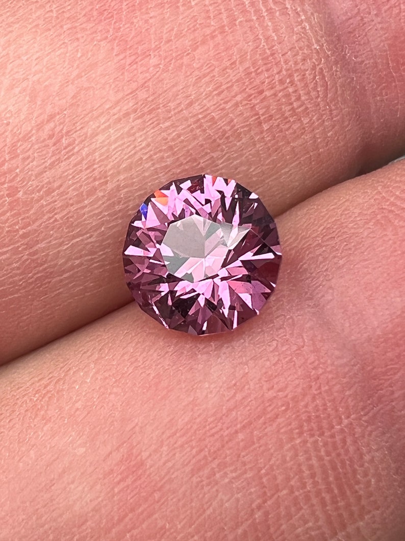 Rare pink, fuchsia color Garnet. Natural, Tanzanian origin gem. Precision cut round. 7.4mm image 1