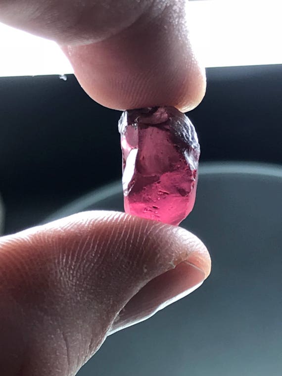 Over 19 carat Umbalite Garnet. Clean, great color, expecting high yield. Great color.