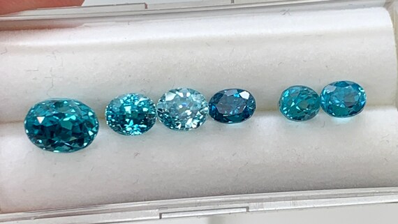 Six piece Blue Zircon Suite! 8.8tcw natural gemstone. Great color and clarity!