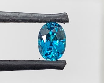 Top color Blue Zircon. 1.66ct oval, natural, Gemstone. Rare. 7x5mm