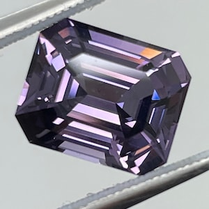Rare grade gem Spinel. Purple 3.87ct untreated, emerald cut, clean, nicely cut piece. 9.9x8.1mm