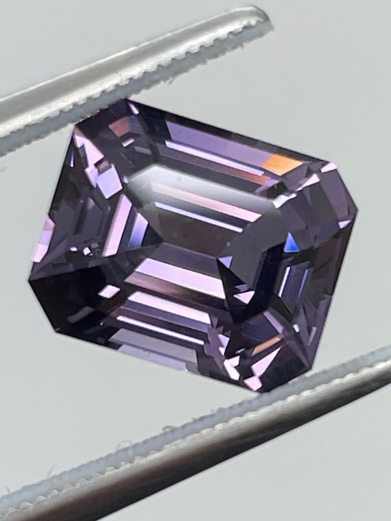 Rare grade gem Spinel. Purple 3.87ct untreated, emerald cut, clean, nicely cut piece. 9.9x8.1mm