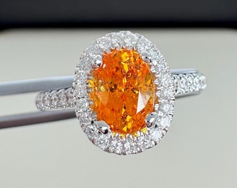 Mandarin Garnet and diamond ring. 14k White gold.